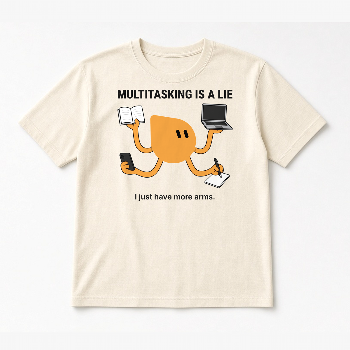 Multitasking Tee – Black design on a Natural tee, flat lay